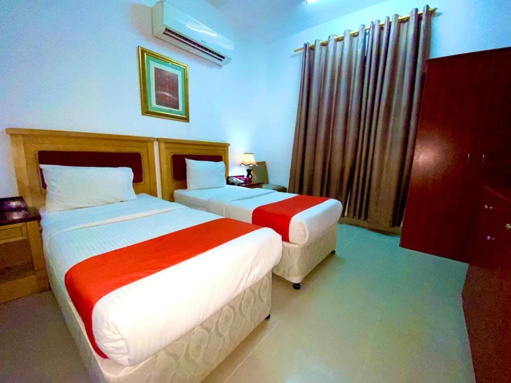 Savoy Inn Hotel Apartments Маскат Экстерьер фото