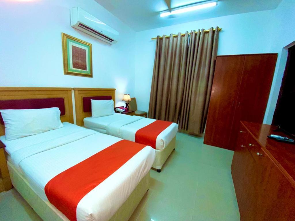Savoy Inn Hotel Apartments Маскат Экстерьер фото