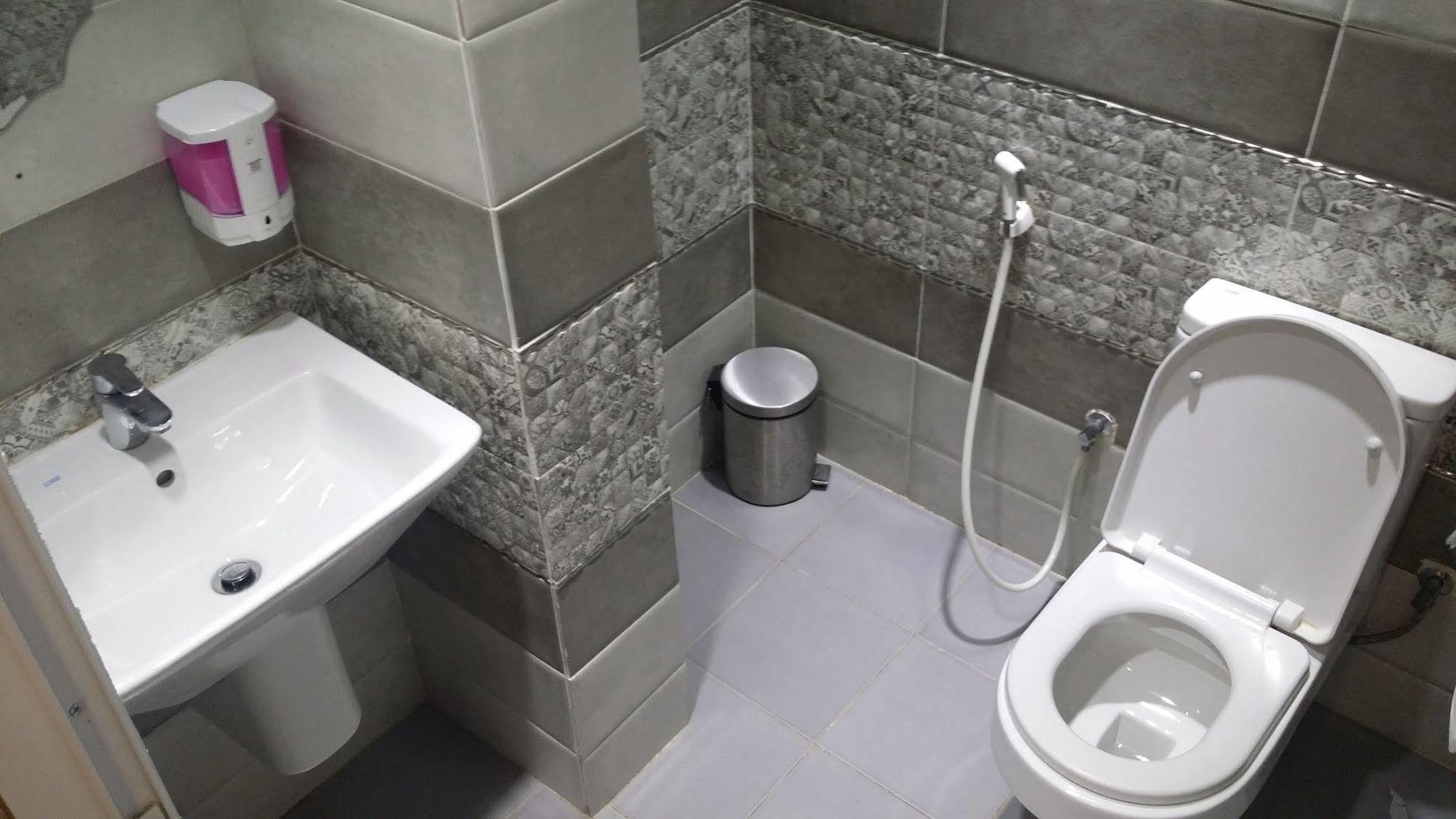 Savoy Inn Hotel Apartments Маскат Экстерьер фото